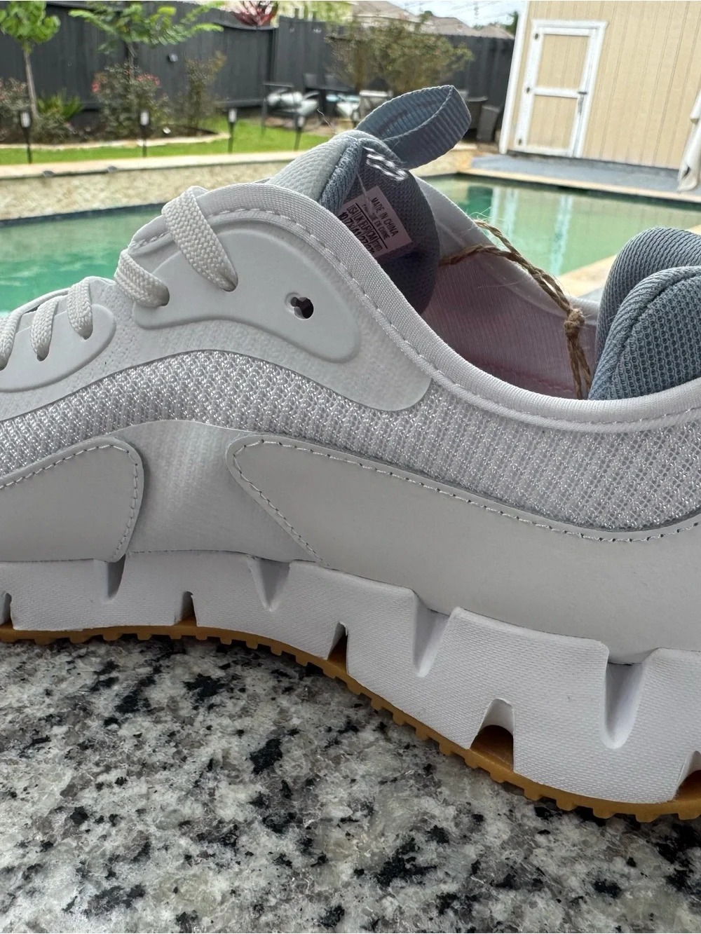 Reebok White and Gray Trail Runner with Orange Logo Accent